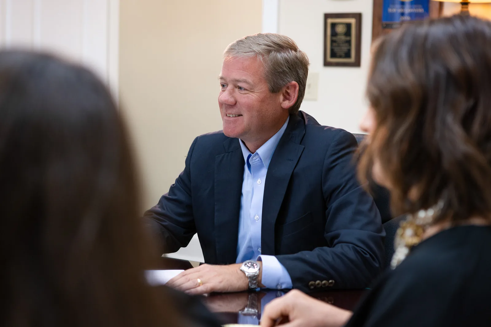 John B. Jackson consulting with a client