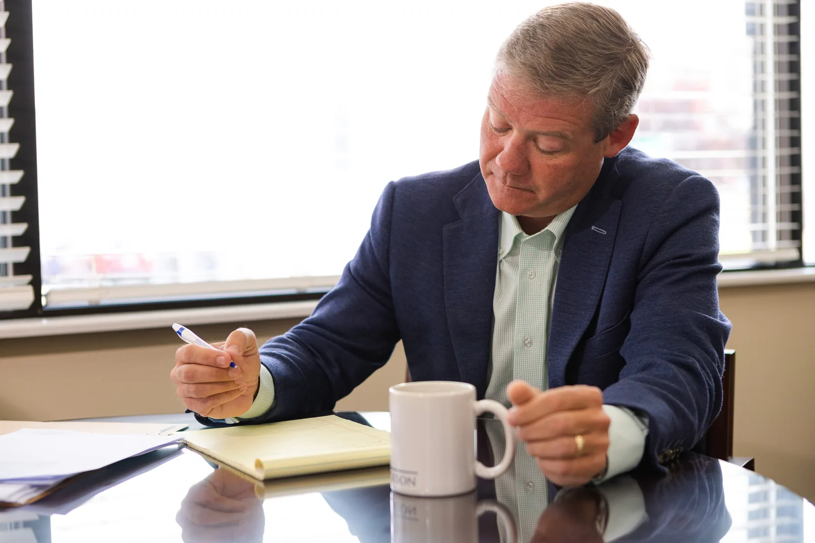 John B. Jackson, West Georgia personal injury attorney reviewing case files